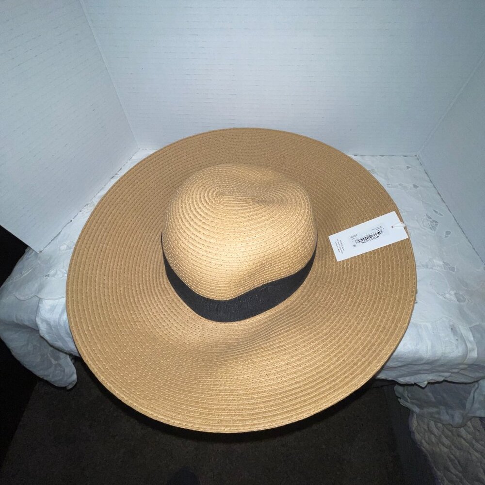 Floppy, wide-brimmed sun hat purchased at Nordstrom. Never worn, new with tags.